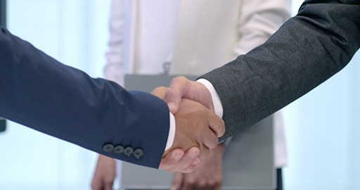 Successful business people shaking hands,4K