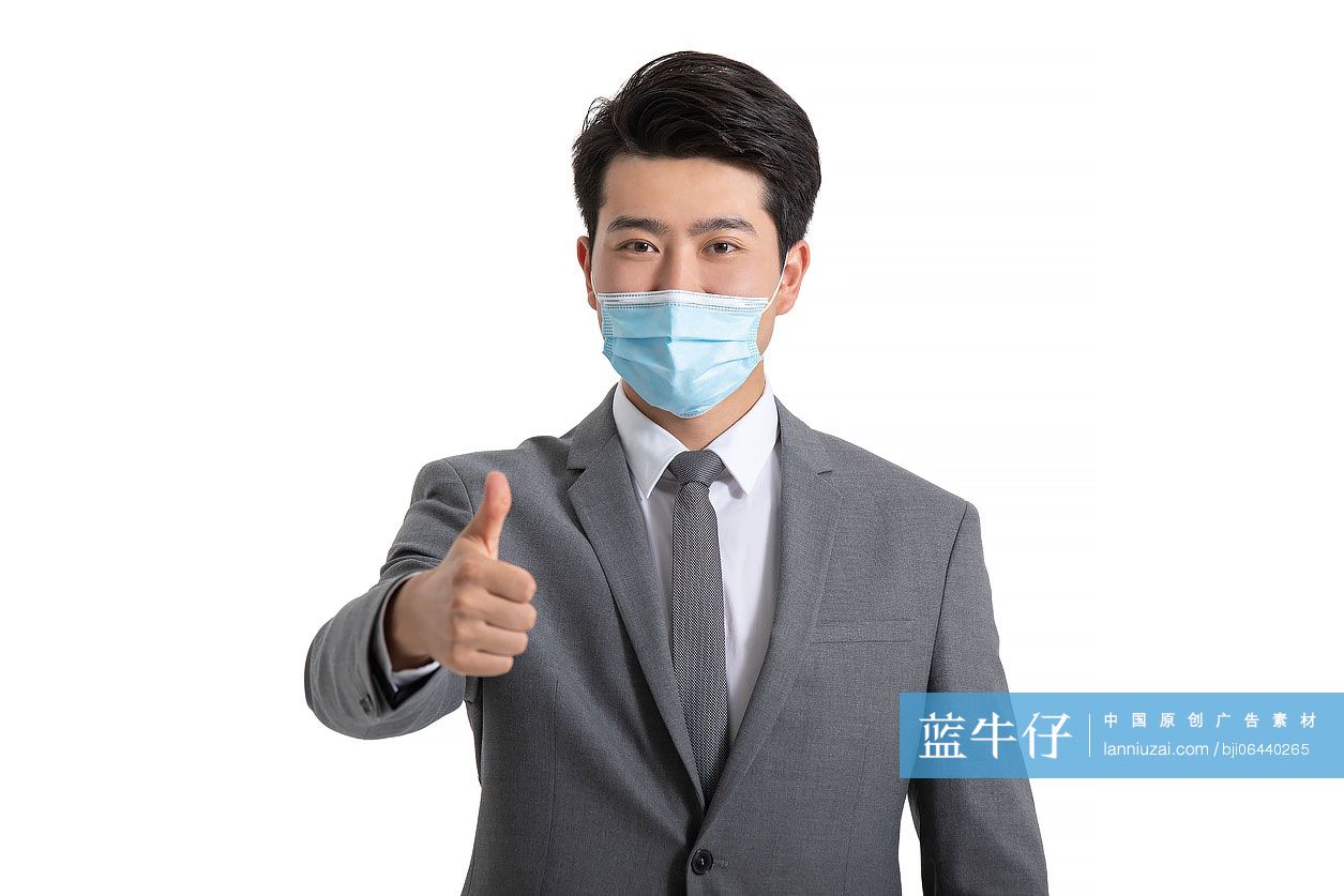 年轻商务男士竖大拇指