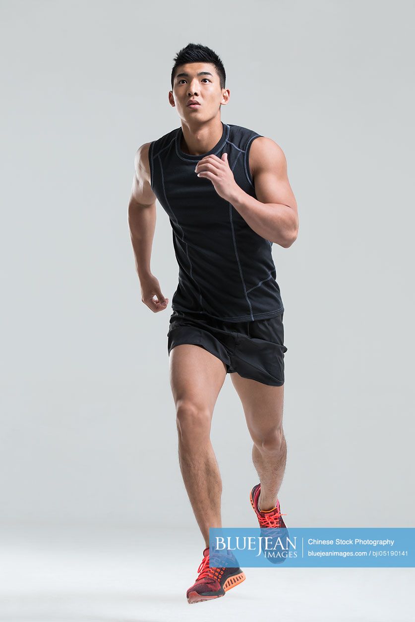 Male Chinese athlete running