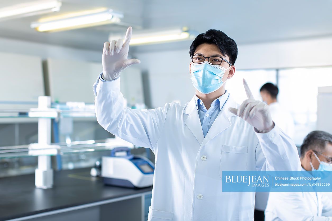 Chinese researchers working in laboratory