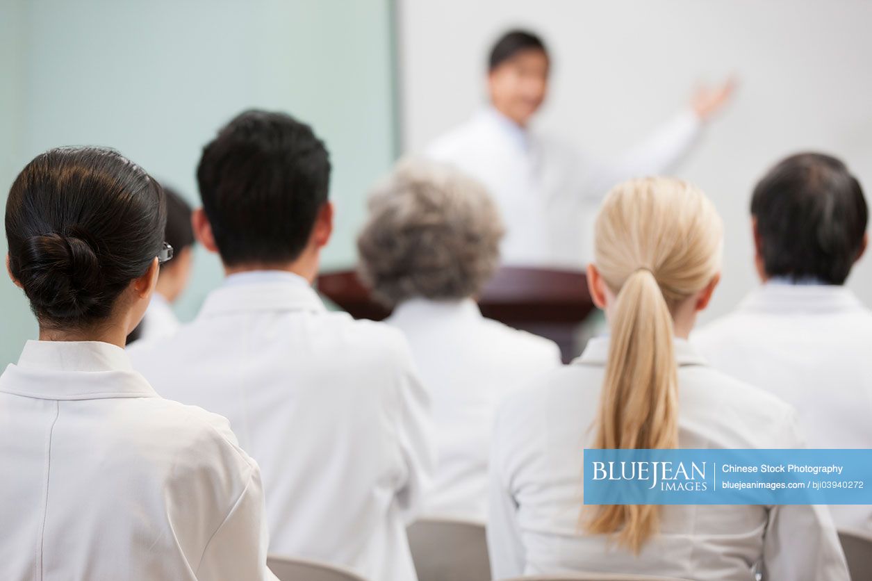 Chinese medical workers in a meeting