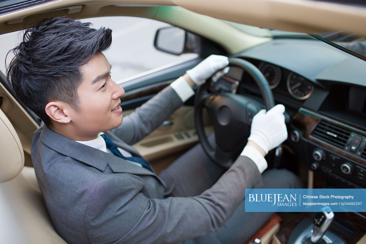 Chinese chauffeur driving car