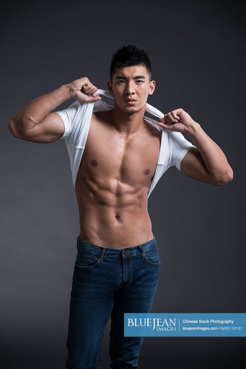 Portrait of young Chinese muscular man