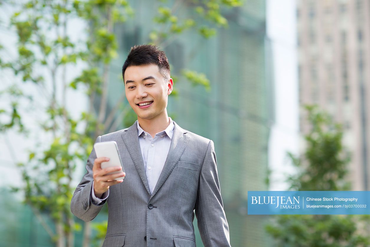 Chinese businessman with mobile phone