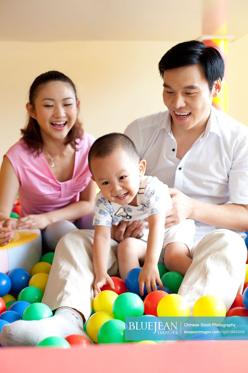 Chinese family playing together