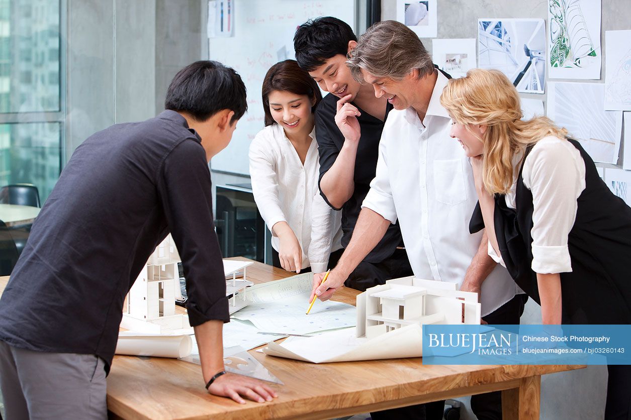 Chinese and western architects working in studio