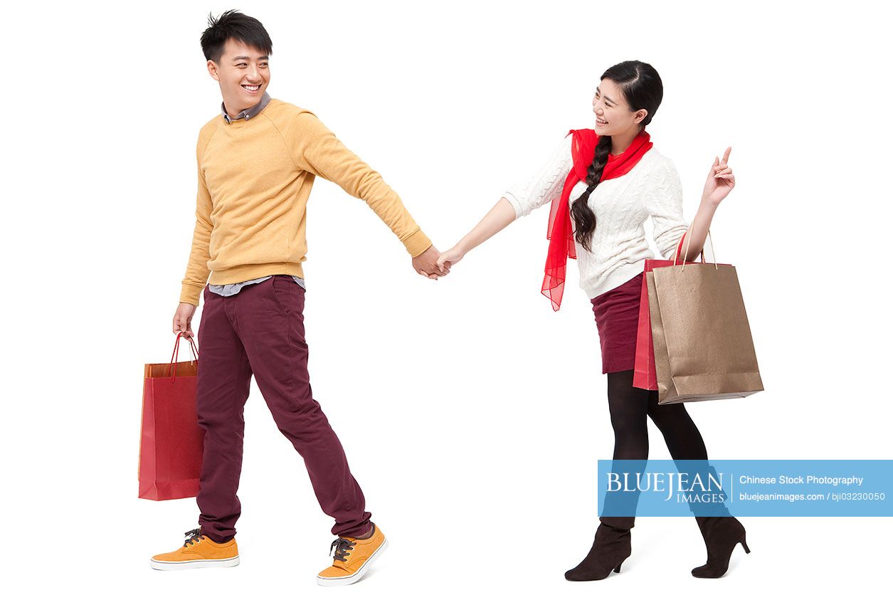 Intimate young couple shopping for Chinese New Year