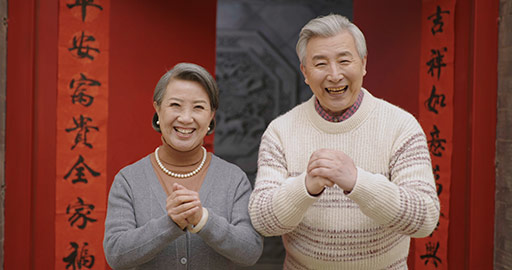 Happy senior couple celebrating Chinese New Year,4K