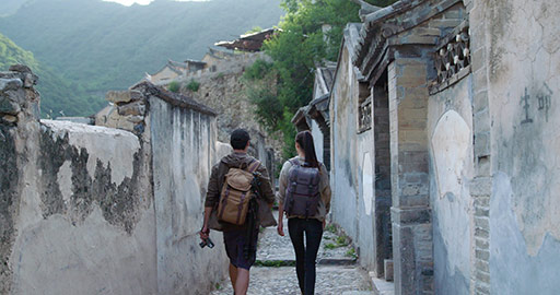 Young Chinese couple hiking in village,4K