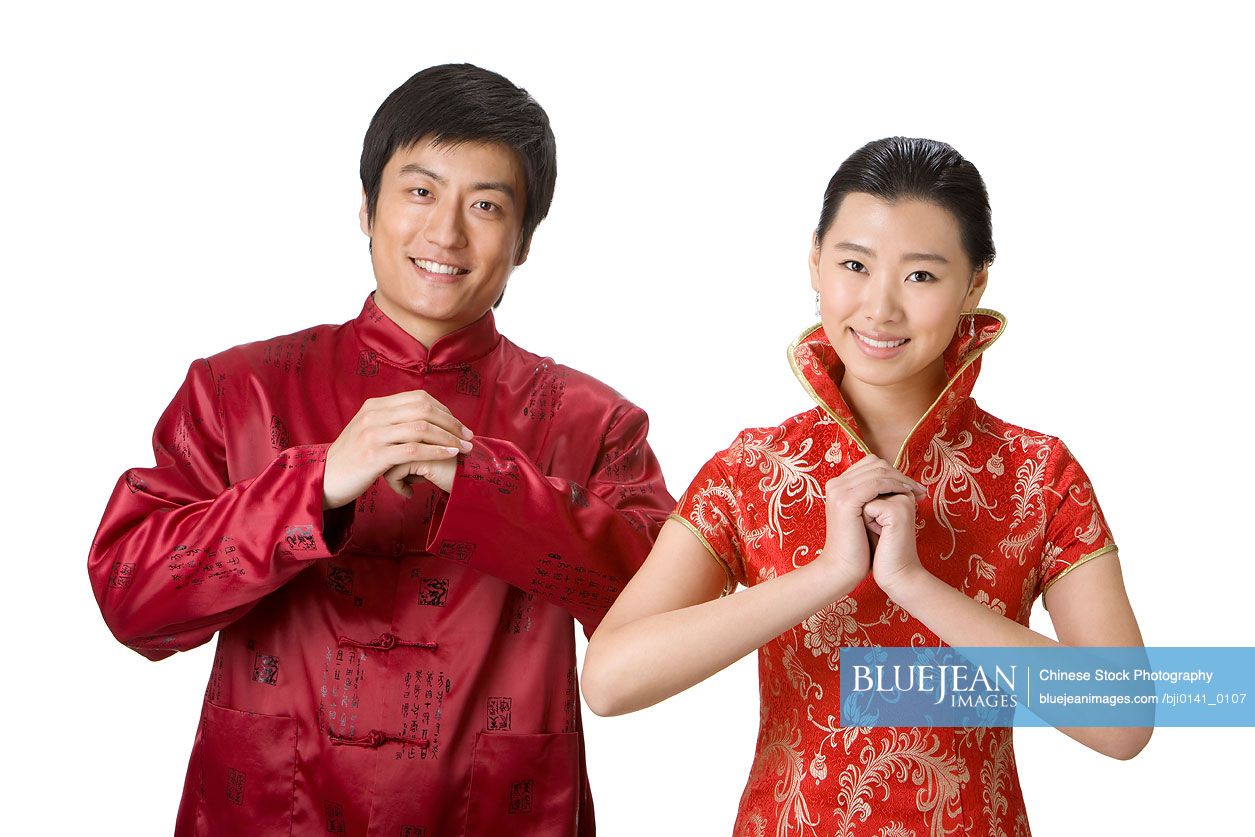 Smiling Chinese Service Staff Conveying Best Wishes