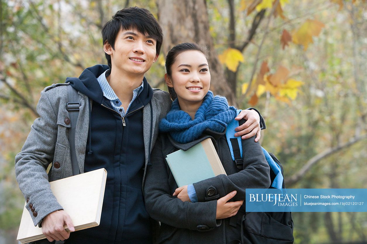 Chinese college couple enjoying a romantic moment together