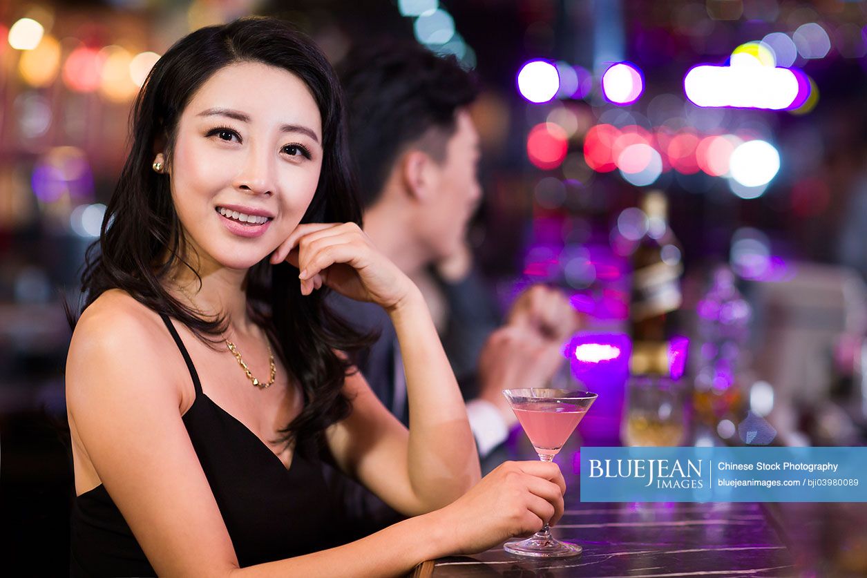 Young Chinese woman in bar