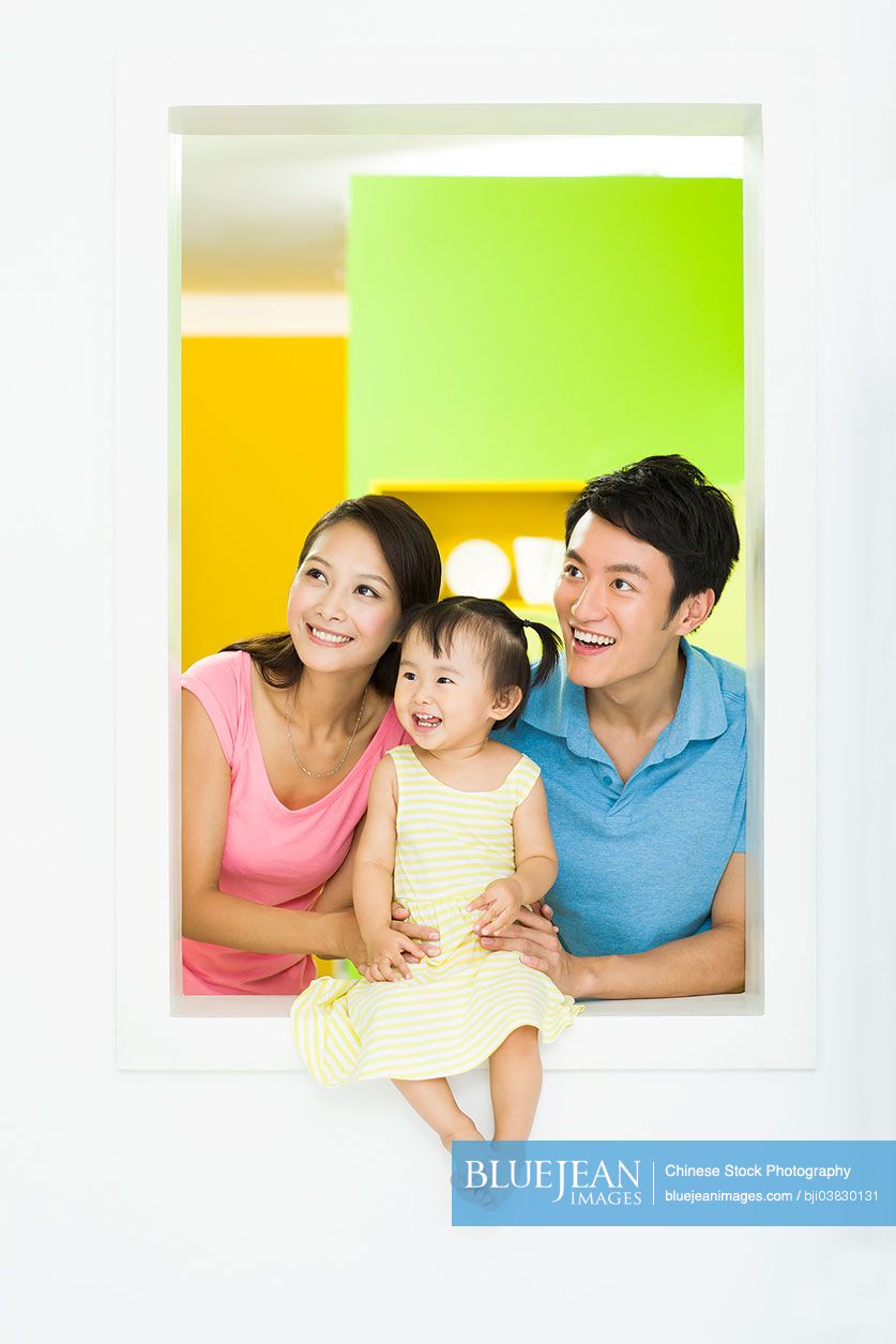 Happy Chinese family smiling