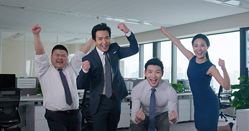 Chinese business people punching the air in office,4K