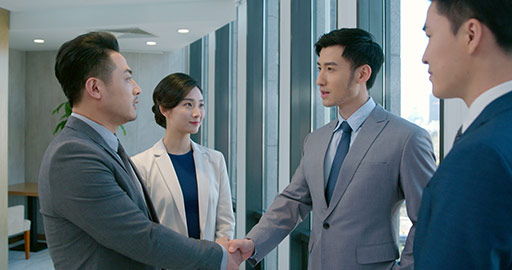 Successful Chinese business people talking in office,4K