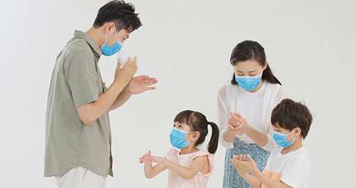 Young Chinese parents teaching children to washing hands with hand sanitizer,4K