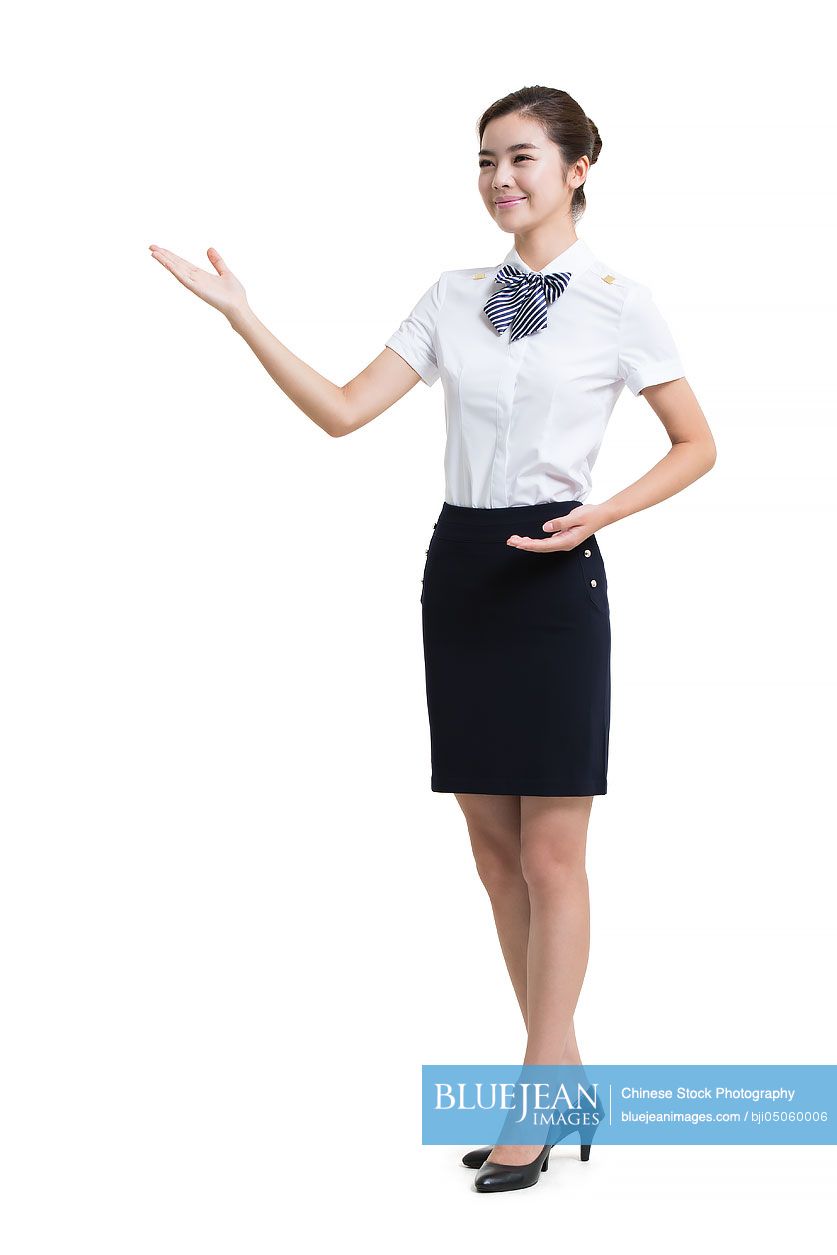 Portrait of smiling Chinese airline stewardess