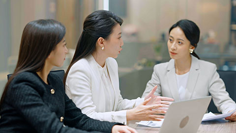 Confident Chinese businesswomen having a meeting