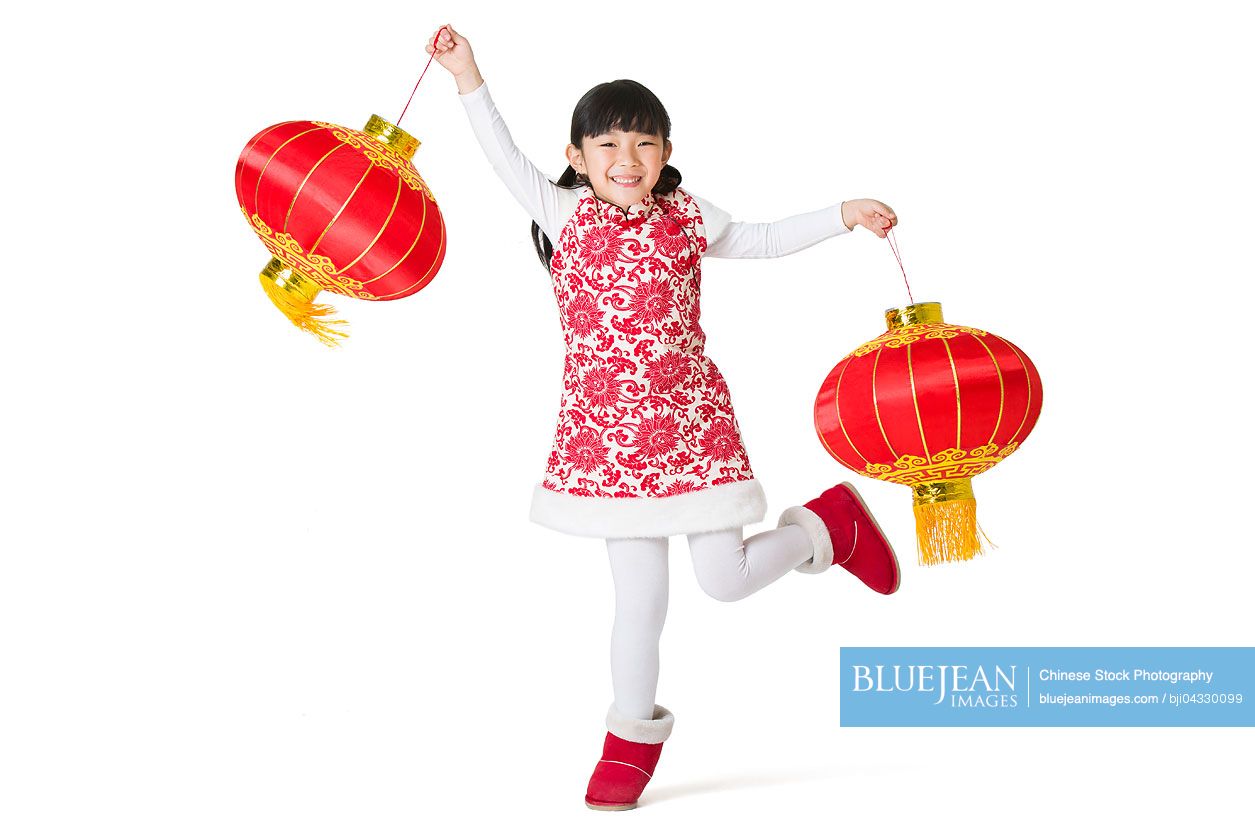 Happy Chinese girl with traditional lanterns
