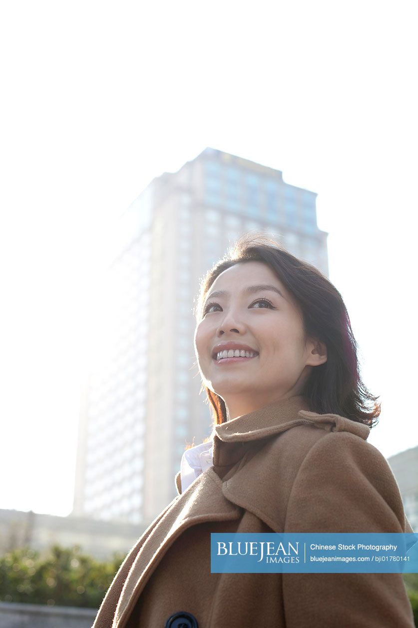 Portrait of Chinese woman outdoors