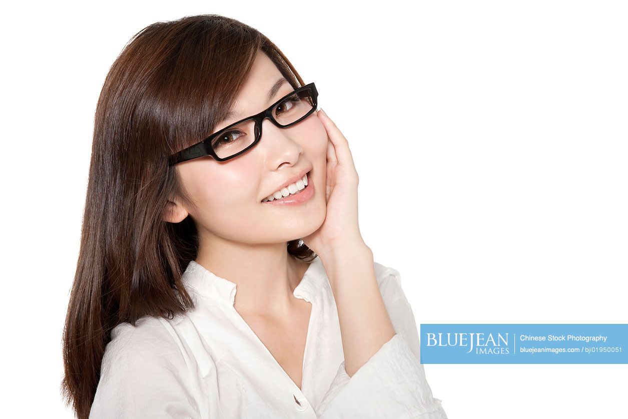 Portrait of young Chinese woman with an idea
