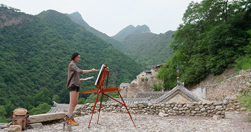 Young Chinese woman painting outdoors,4K