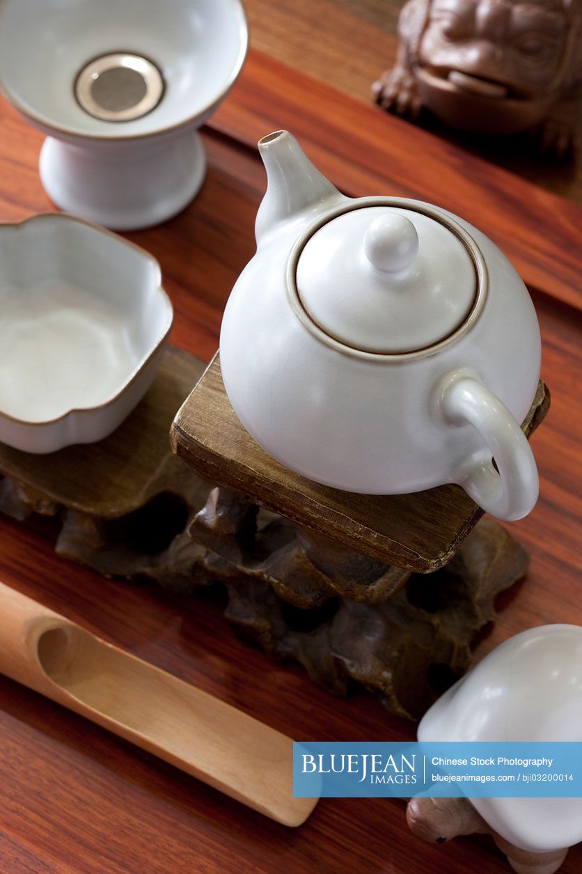 Close up of traditional Chinese tea set and ornaments