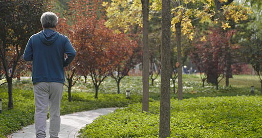 Happy senior Chinese man running in the park,4K