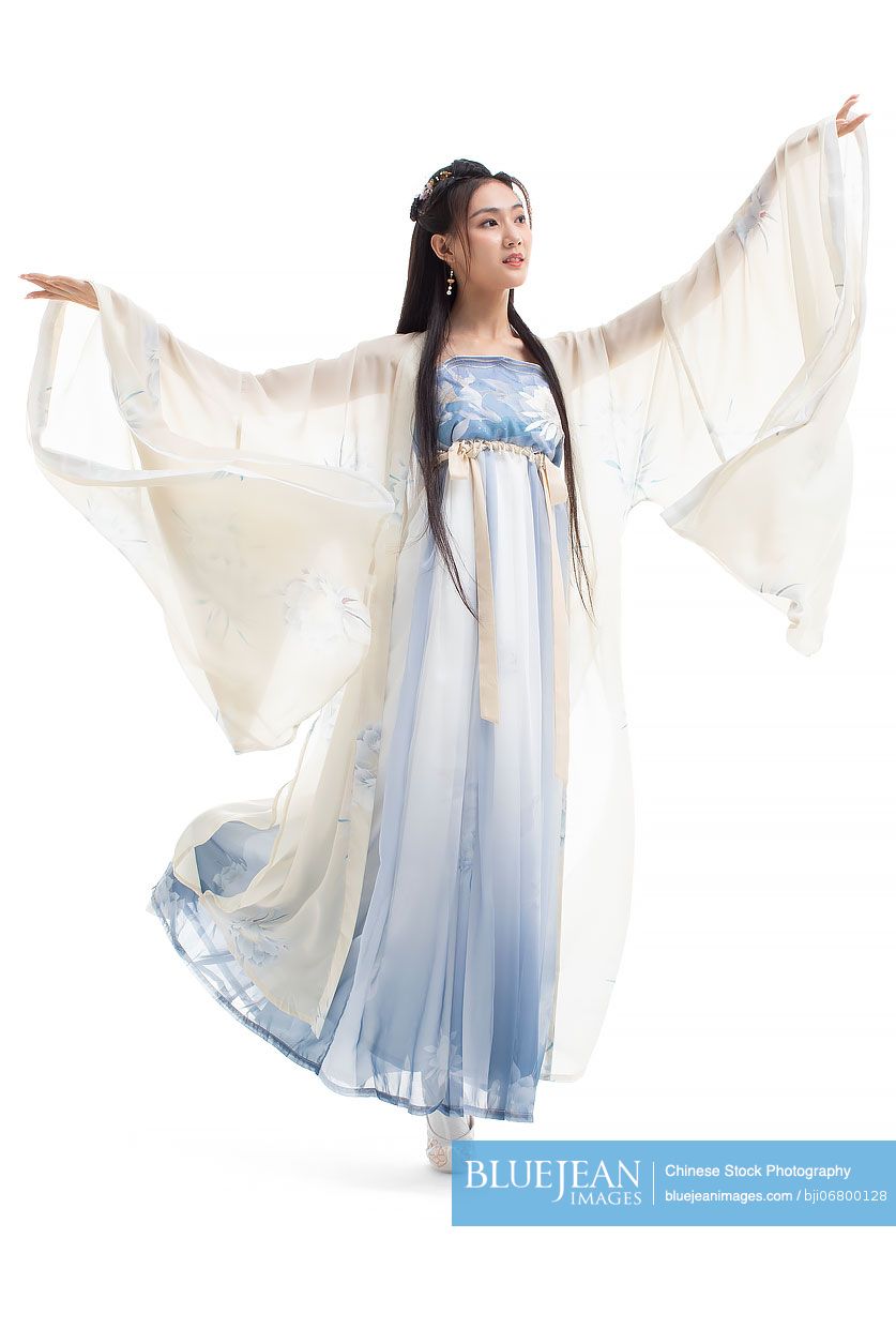 Beautiful young Chinese woman in ancient costume dancing-High-res stock ...