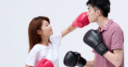 Humorous young Chinese couple practicing boxing,4K