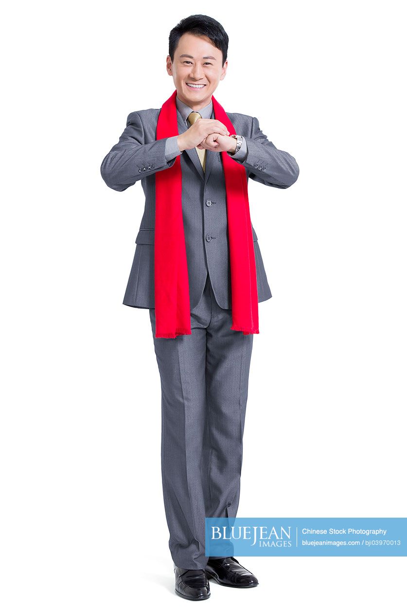 Chinese businessman offering traditional Chinese New Year greeting