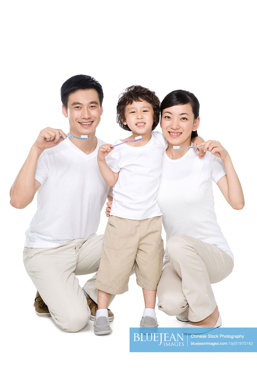 Chinese family brushing teeth