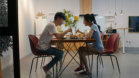 Happy young Chinese couple enjoying dinner,4K