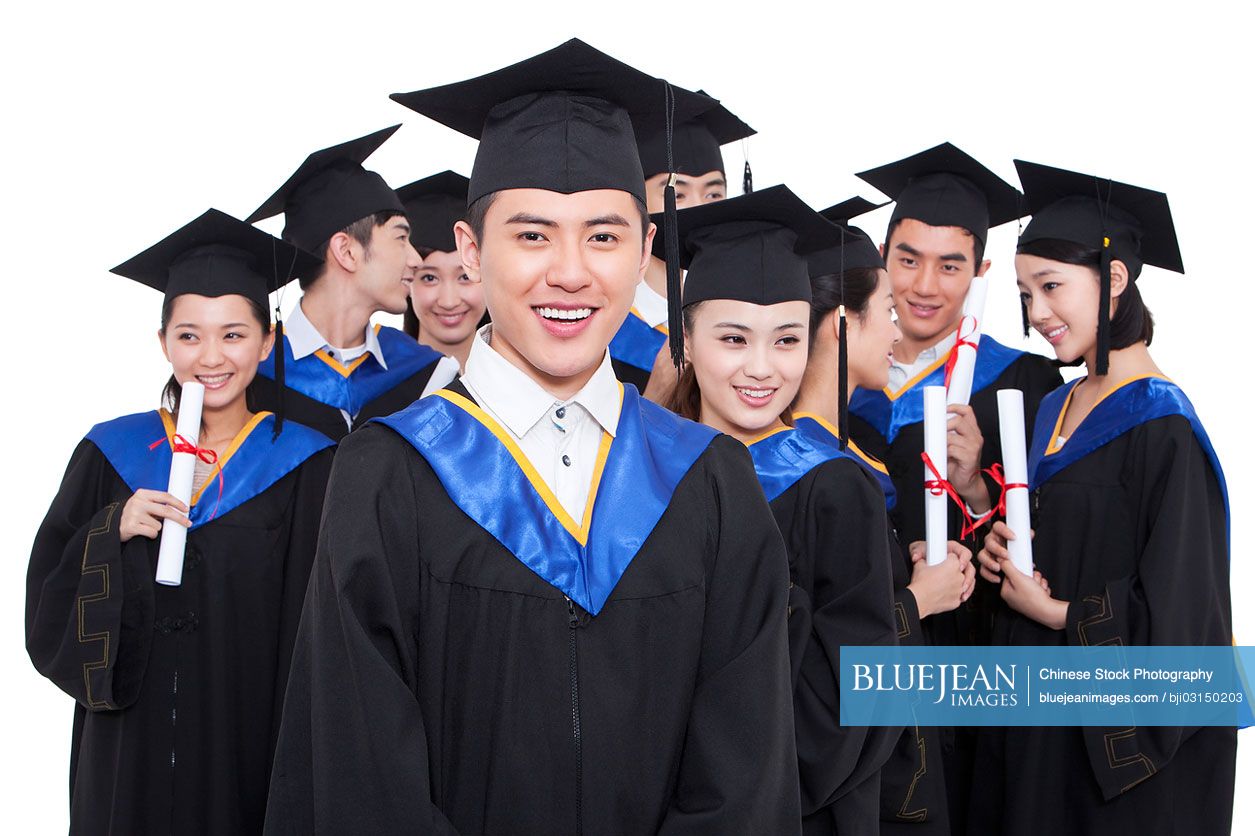 Portrait of Chinese graduates holding diploma