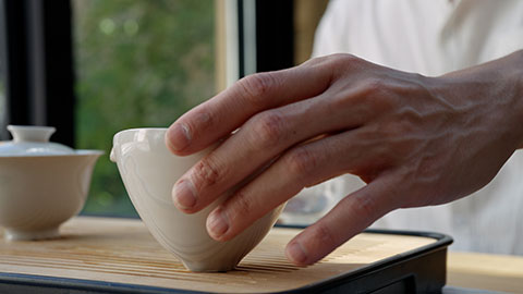 Mid adult Chinese man drinking tea in tea room,4K