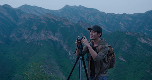 Chinese photographer taking photos outdoors,4K