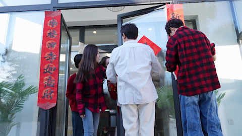 Young friends celebrating Chinese New Year together