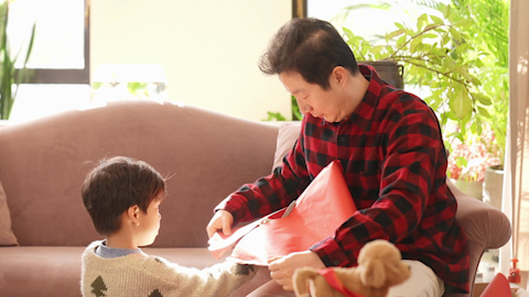Family joyfully celebrating Chinese New Year together
