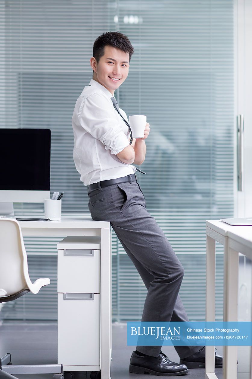 Chinese businessman taking a coffee break