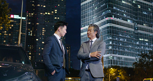Successful Chinese businessmen talking outdoors,4K