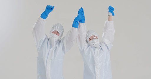 Chinese medical workers in protective suit punching the air,4K