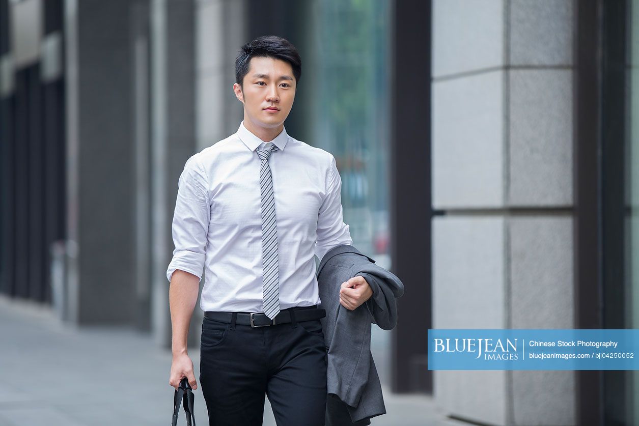 Chinese businessman walking