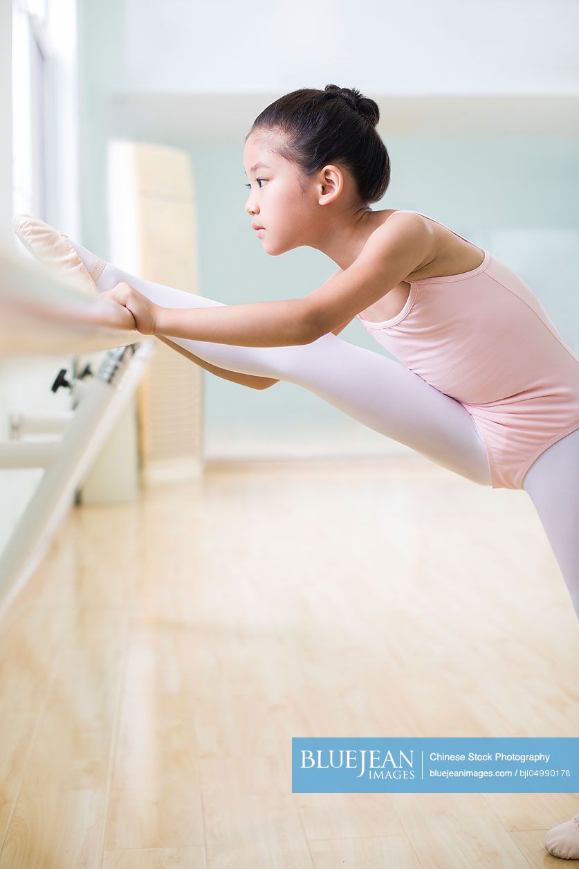 Little Chinese girl practicing ballet