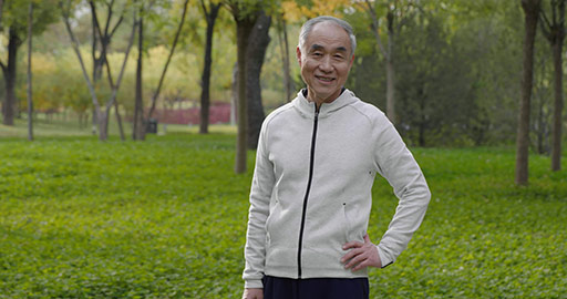 Happy senior Chinese man exercising in the park,4K