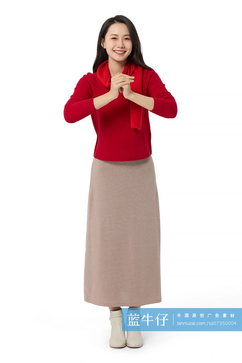 开心的年轻女子作揖拜年