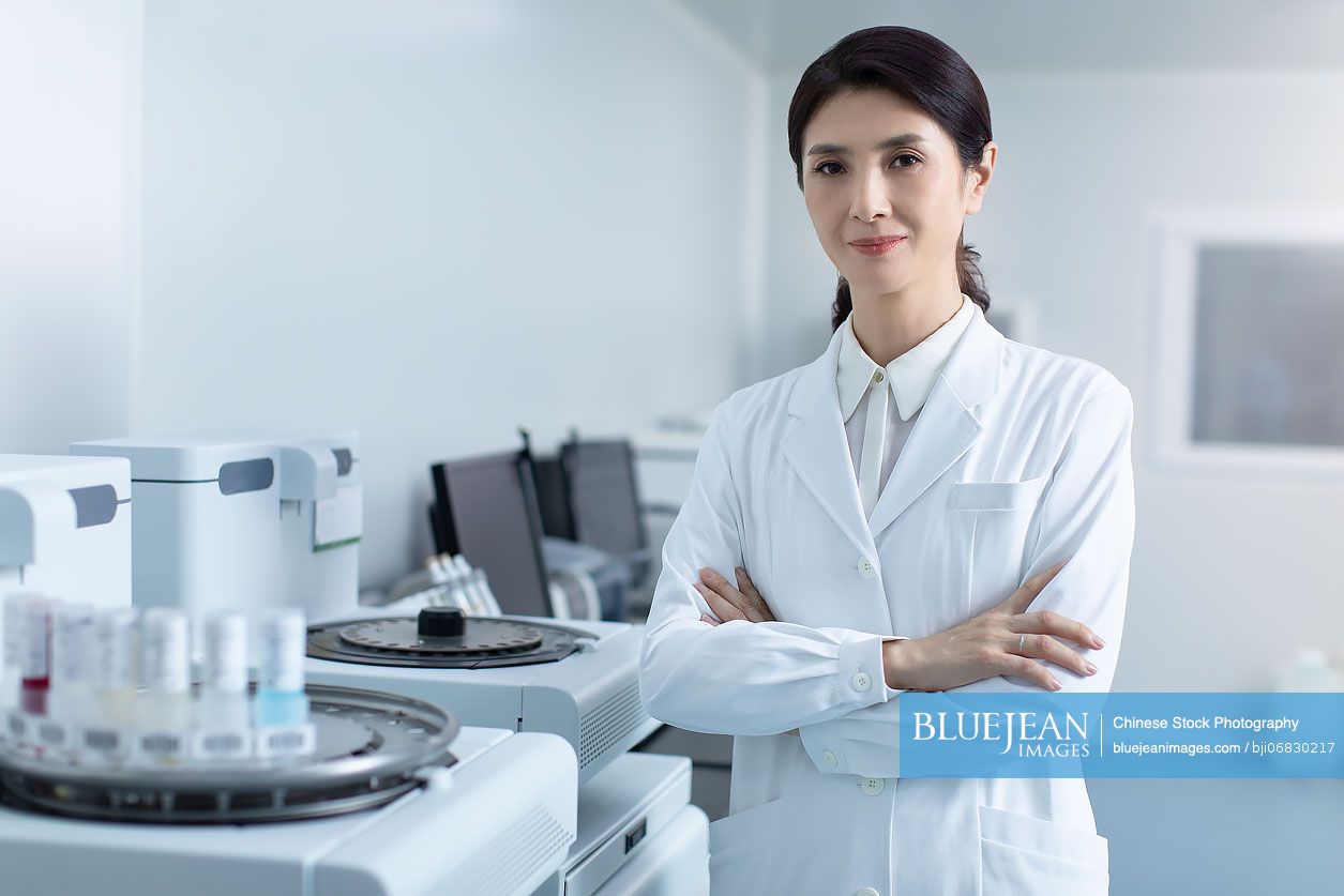 Portrait of Chinese female researcher in laboratory
