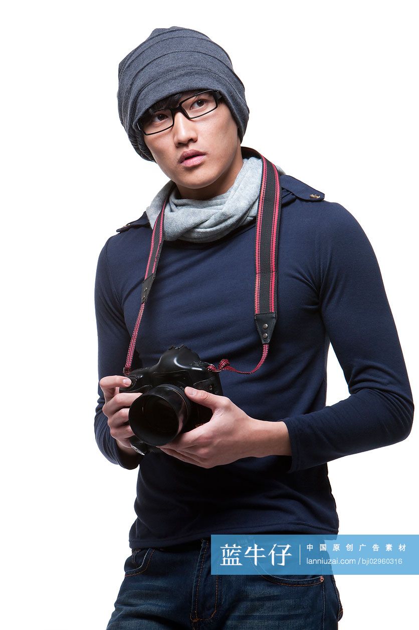 拿着相机的摄影师