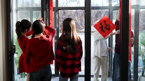 Young friends celebrating Chinese New Year together