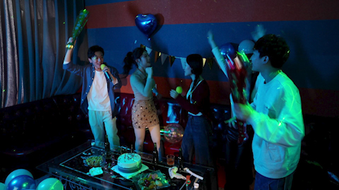 Young friends enjoying a fun karaoke night