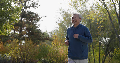 Happy senior Chinese man running in the park,4K